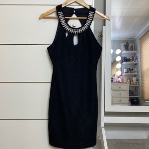 Black dress with some dots of shimmers